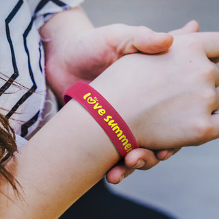 Strike Silicone Wrist Band - Embossed (Red) — Feature